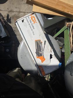 HDX 14 INCH TILE CUTTER $25