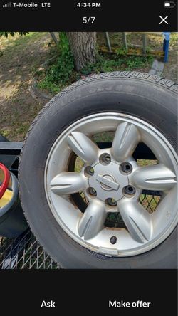 15” oem nissan hard body rims two good tires other two good for spare