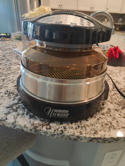 NUWAVE Oven Pro Plus with Stainless Steel Extender Ring
 Nice for grilling turkey for Thanksgiving celebration