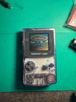 Gameboy Color with Tony hawk pro skater and wall outlet