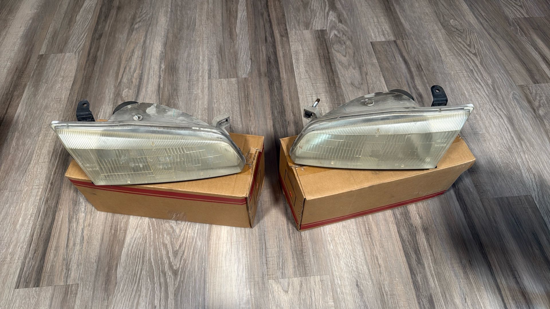 1999 Toyota Camry LE headlight Assembly (OEM)  $30