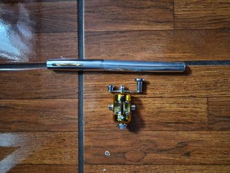 Fishing pole, silver, 8" and goes to 39"