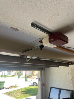 Garage Door Opener Spring Off Track Replace Adjustment And Parts