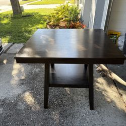 Wooden Table And Four Chairs