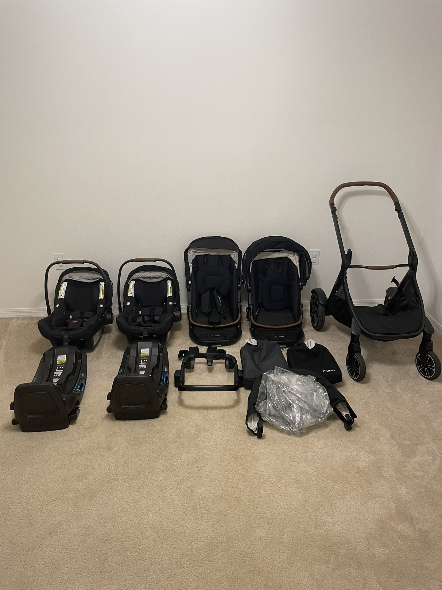 Nuna Lite RX Infant Car Seats, Bases And Double Stroller. Caviar Color