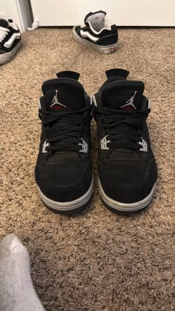 black canvas jordan 4