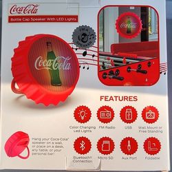 coca-cola bottle cap bluetooth speaker and radio