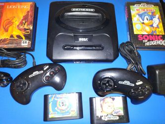 Sega Genesis console and 4 games, 2 controllers, works great.