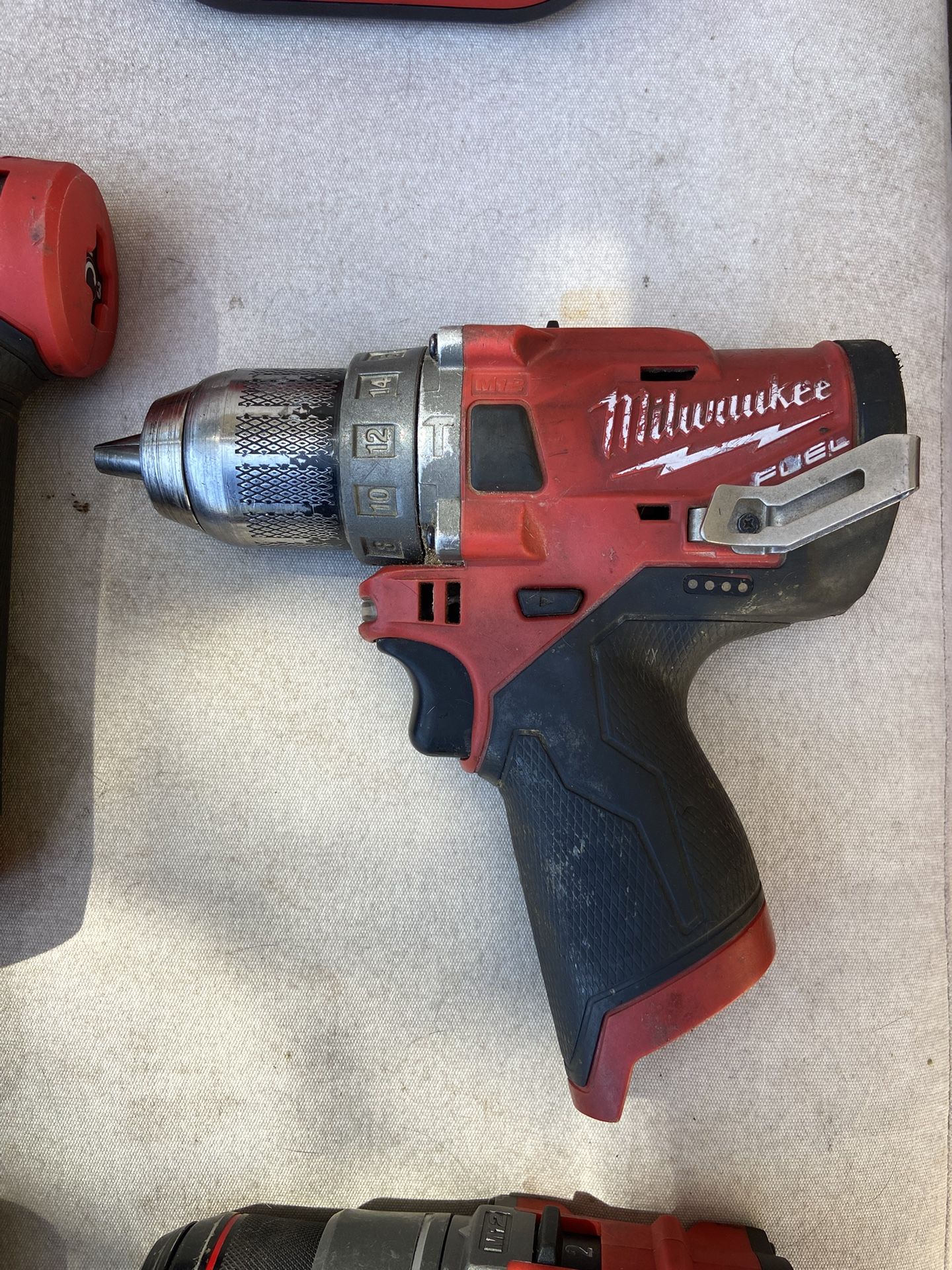 Milwaukee Fuel M12 Hammer Drill x2