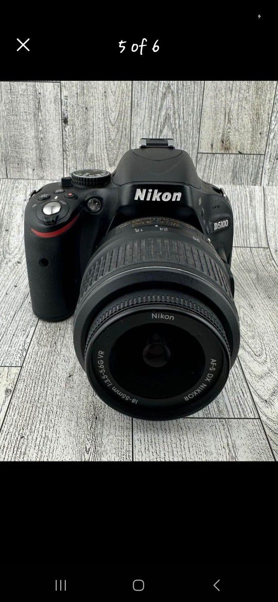 nikon d5100 with charger battery and extras