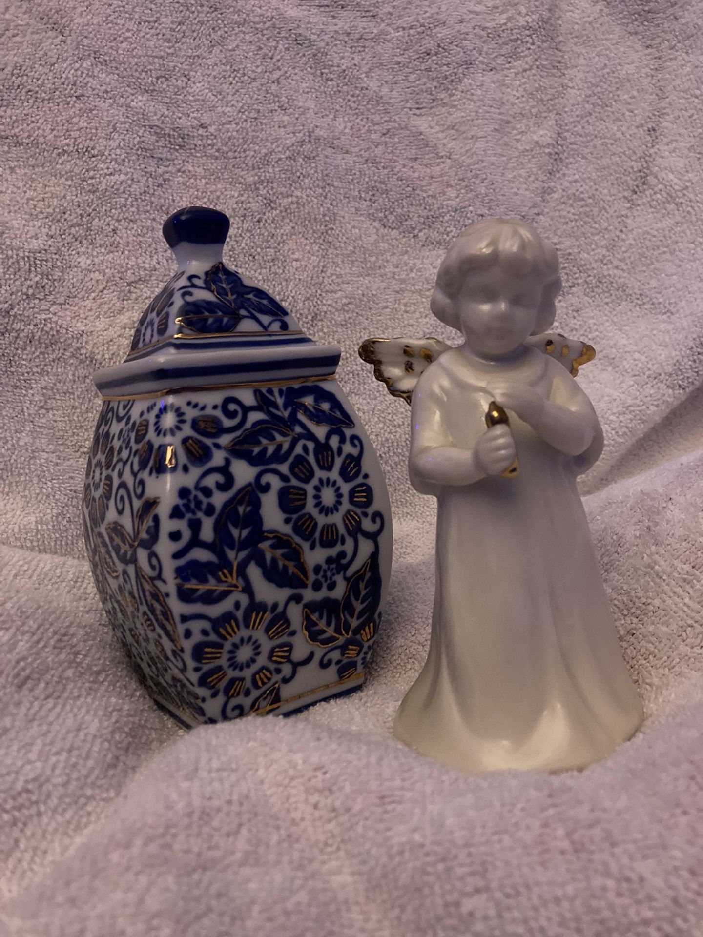 Ornate Vase And Angel Figure