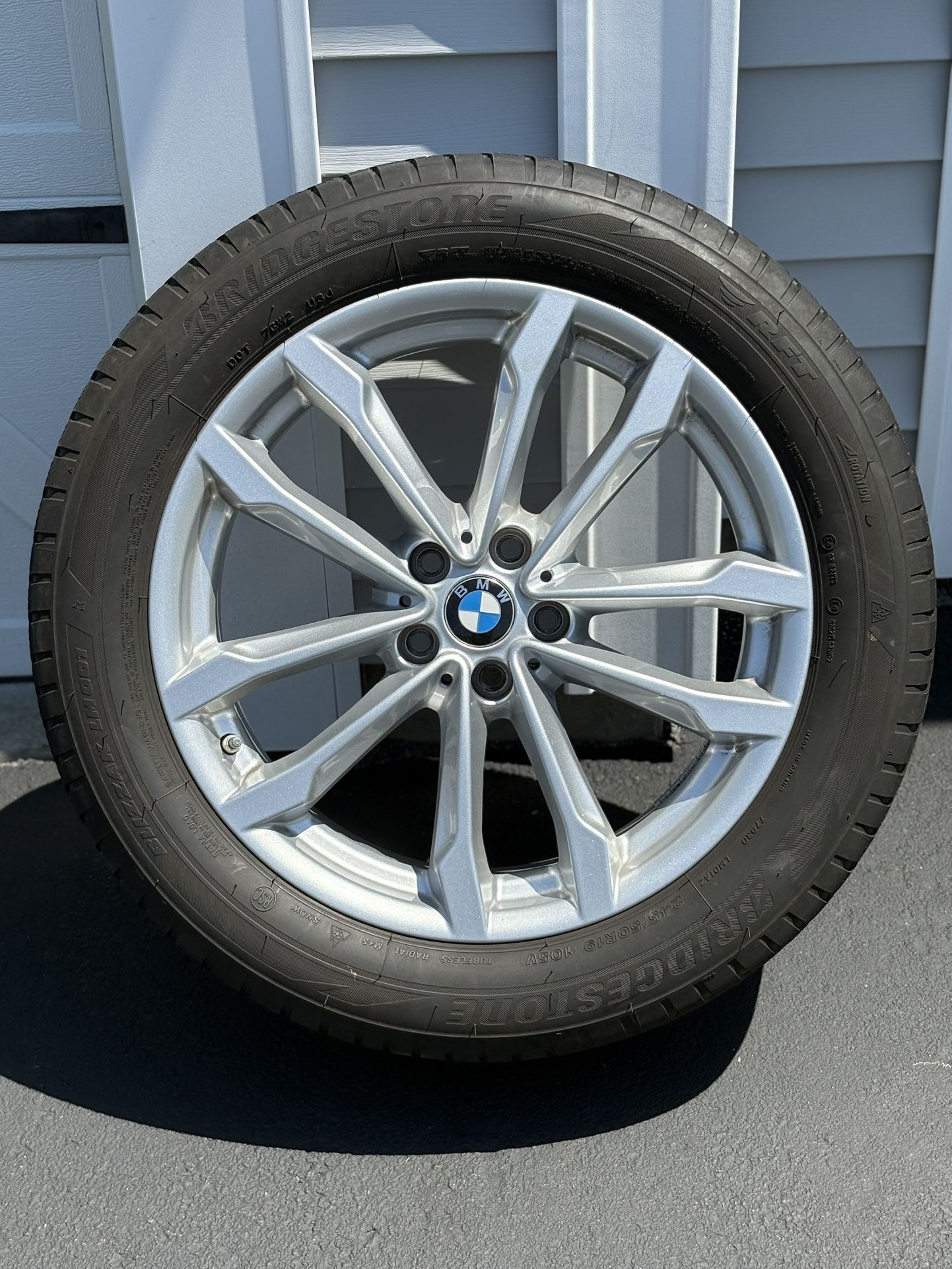 Four Bridgestone Snow Tires With BMW Rims
