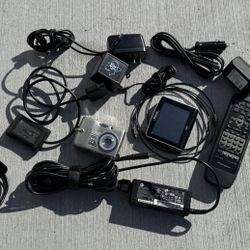 Mixed Electronics Bundle Nikon, HP Charger GPS Etc