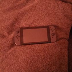 Nintendo Switch And Charger 