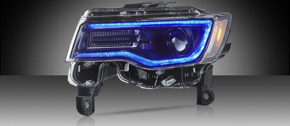 Passenger Side, Headlight Off Of A Jeep Cherokee