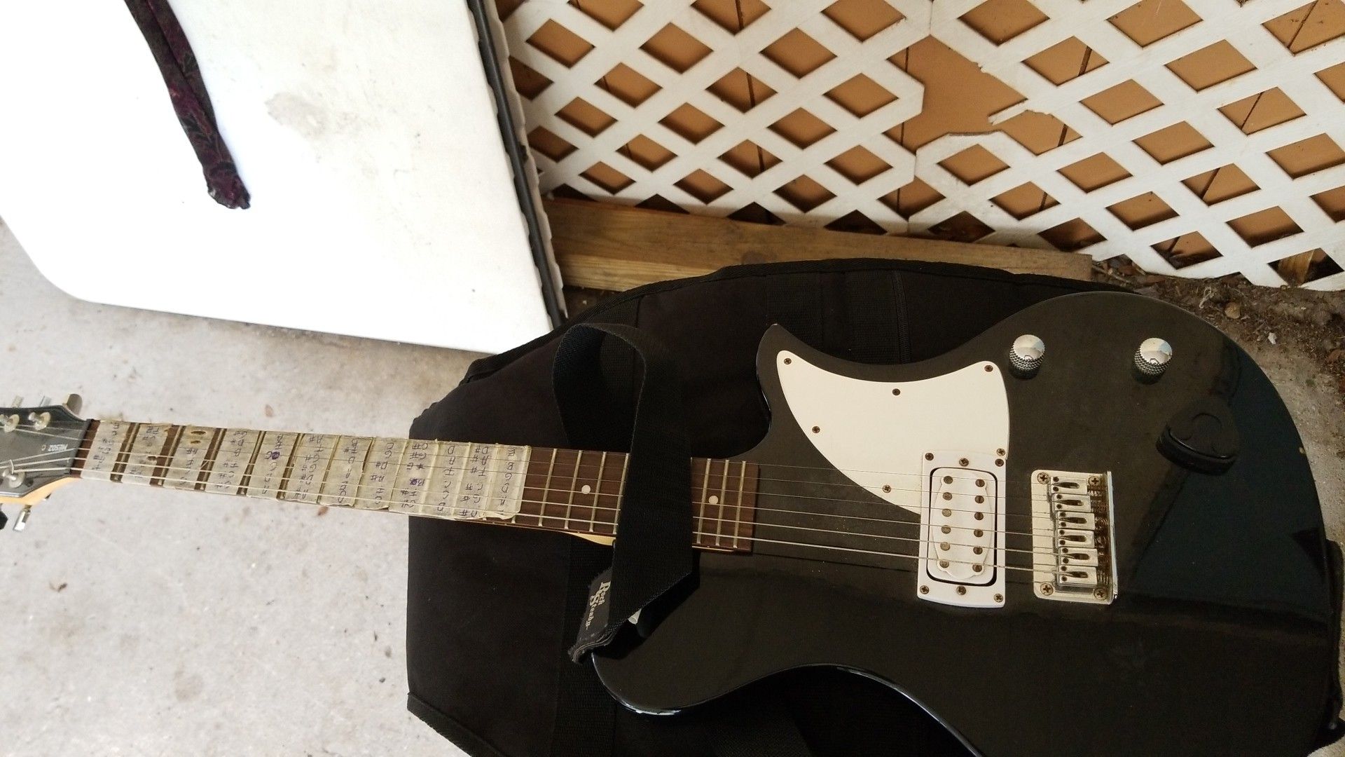 Electric guitar with bag