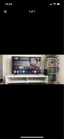 TV, TV stand and bookshelf