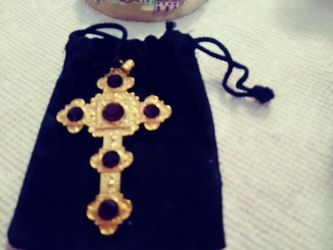 Cross necklace with red stones