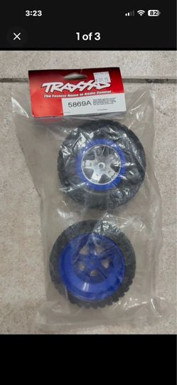 Traxxas 5869A Tires & wheels, assembled, glued (SCT chrome, blue beadlock style
