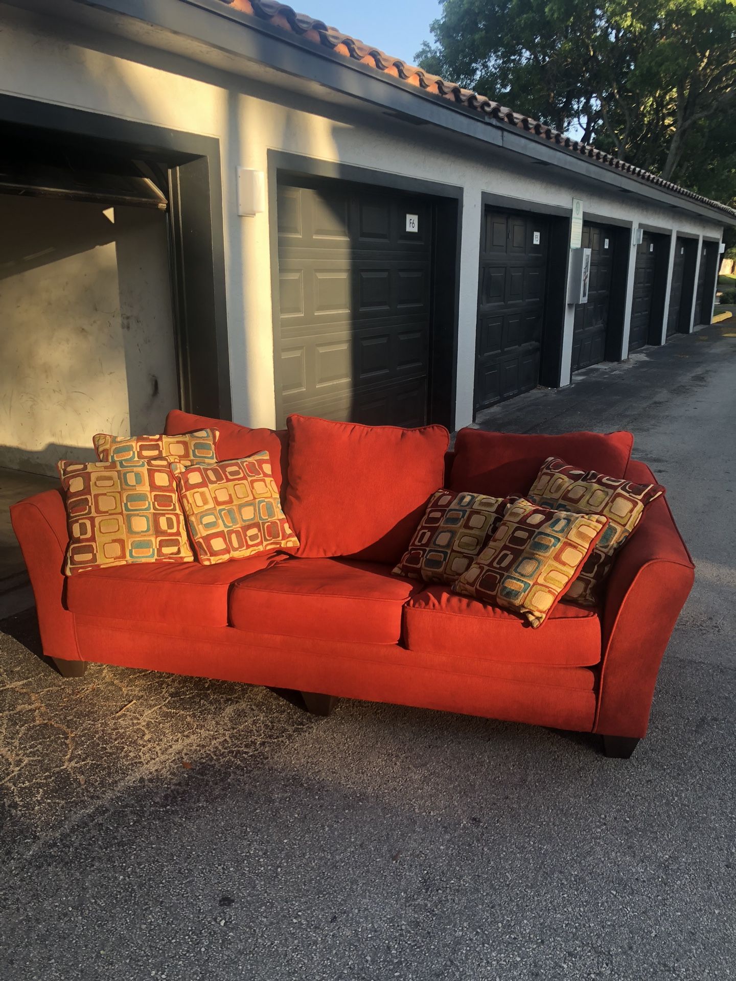 TWO PIECE SOFA / COUCH / SLEEPER / LOVE SEAT / BURGUNDY & GREEN COLOR FABRIC / IN GOOD CONDITION / DELIVERY NEGOTIABLE