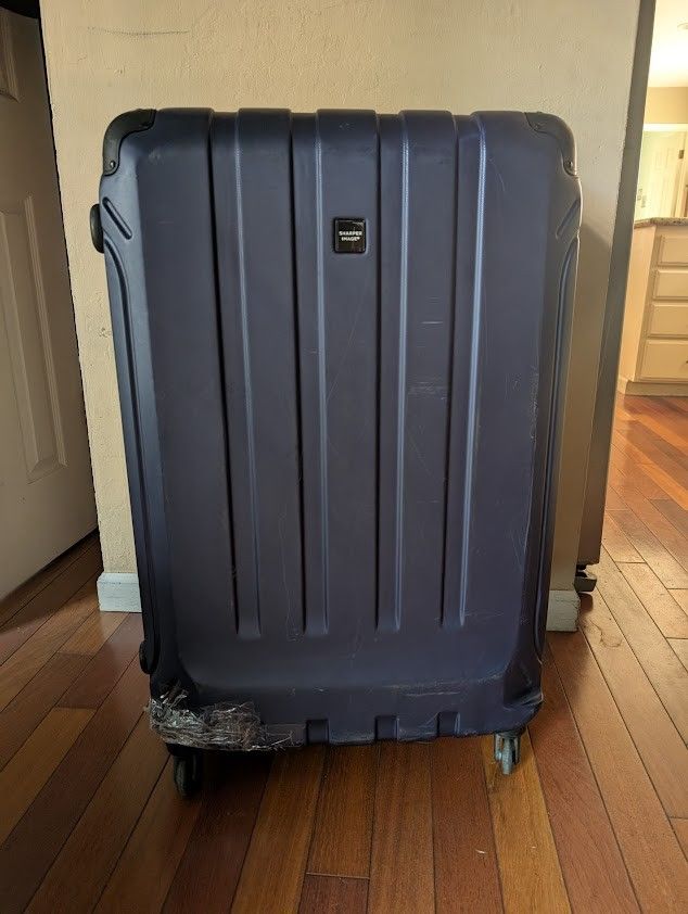 Jumbo rolling suitcase luggage storage bag on wheels (larger than check-in size)