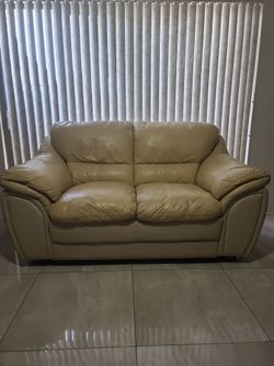 Leather loveseat two tone color