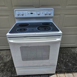 Clean White GE Glass Top Stove 