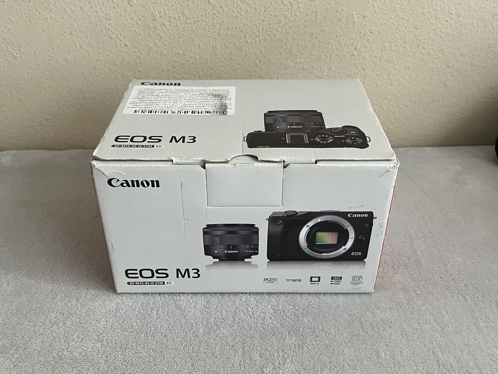 Canon EOS M3 with kit lens and filters