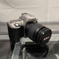 Nikon N65 Camera With Bag And Supplies