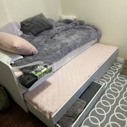 Bed W. Bed Underneath and Storage Under That