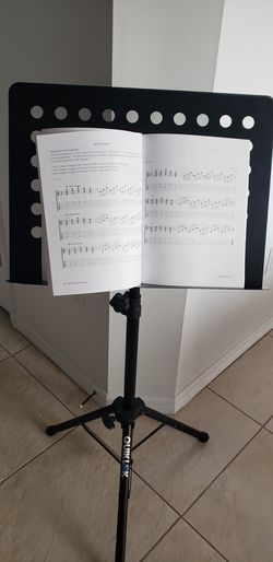 Sheet Music Stand with All Metal Perforated Music Holder. Manufactured using heavy duty steel tubing and high‑grade hardware Sturdy tripod leg. QUIKL