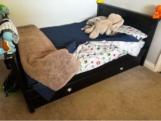 Full bedframe with twin trundle under