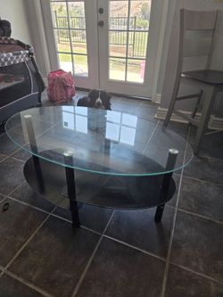 Glass multi level coffee table