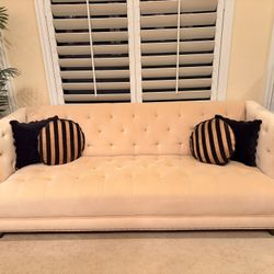 Suede couch and 2 black sofa chairs