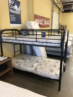 Bunk bed with mattresses