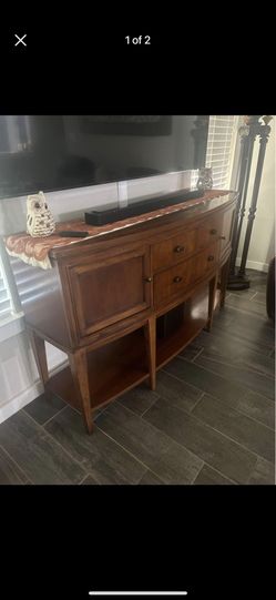 Universal Furniture Sideboard…Beautiful solid wood sideboard. Currently being used as a TV STAND. In excellent condition. Delivery available! 