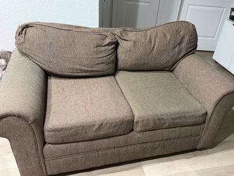 Two sofas and a round glass dinning table for Salw