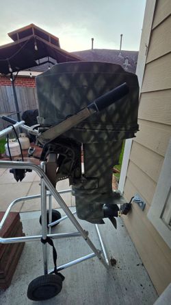 Dinghy boat with motor and trailer
