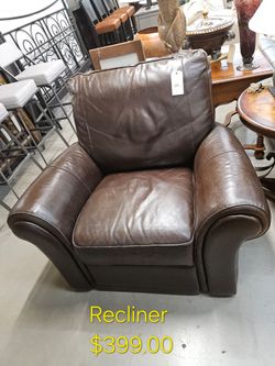 Brown Leather Recliner Chair We are located at 2811 East Bell road. Another Time Around Furniture.