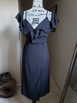 black sheer wrap and tie dress