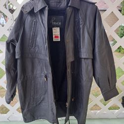 Tirage women’s Hooded  Black Leather Coat w Removable Lining & Hood
This stylish coat is new old stock. Never worn original price tag. Genuime Leather