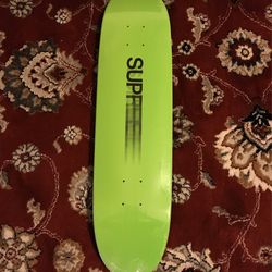 SUPREME NEON GREEN MOTION LOGO SKATEBOARD DECK