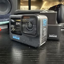 GoPro HERO12 w/ 2 Extra Batteries and Carry Case