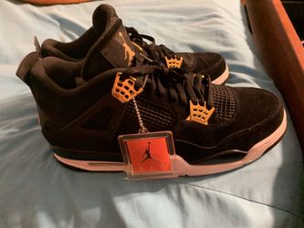 Air Jordan 14 black and gold