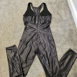 Fabletics Motion365+ Shine Jumpsuit in black. 