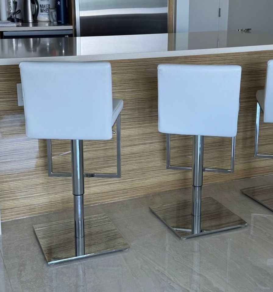 3 white leather stools with chrome base