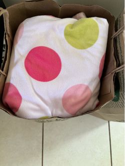 Bag of pink baby blankets