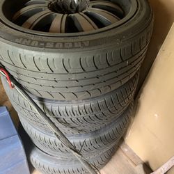 22’s Rims And Tires With Center Caps 