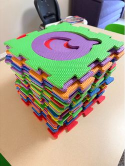 Alphabet puzzle play mat