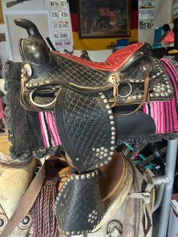 Pony saddle and wool pad